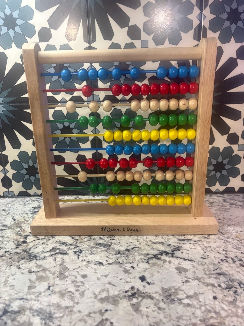 Melissa & Doug Wooden Counting Abacus in Red, Blue, Green, Yellow, Natural
